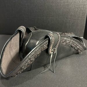 Pirate hat . Black . Leather . A great hat but it’s too big for me. NWOT